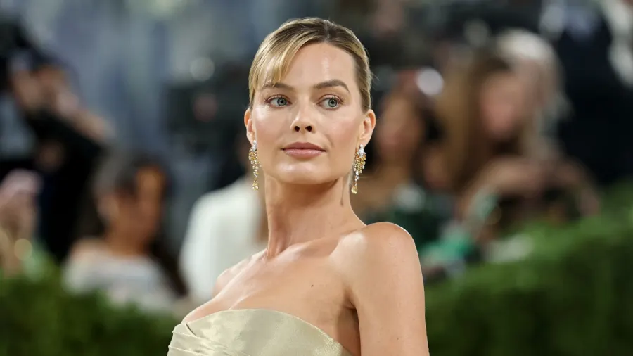 from barbie to balayage margot robbie s style secrets holiday looks and the hair