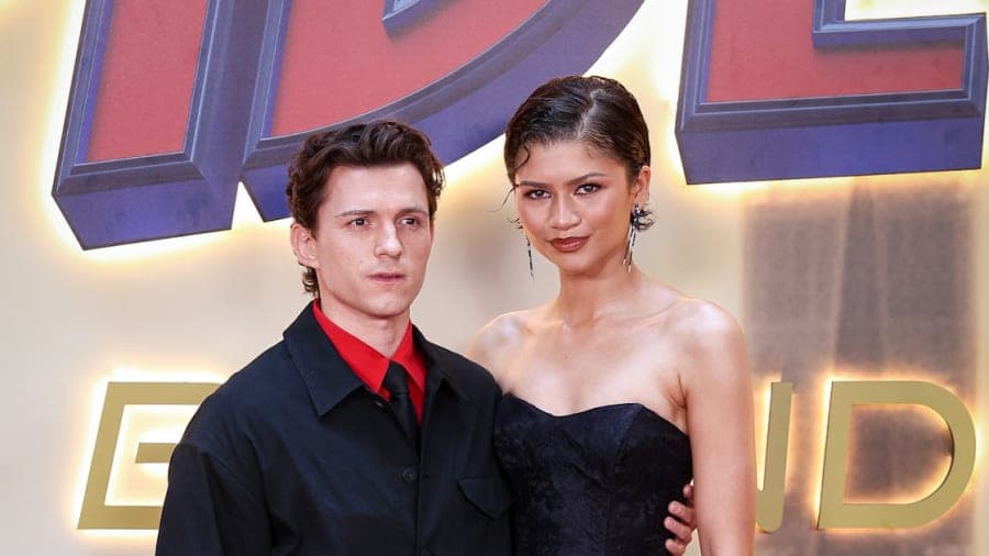 Zendaya on the red carpet at the Spider-Man Brand New Day Amsterdam photocall wearing a Louis Vuitton black and red ensemble